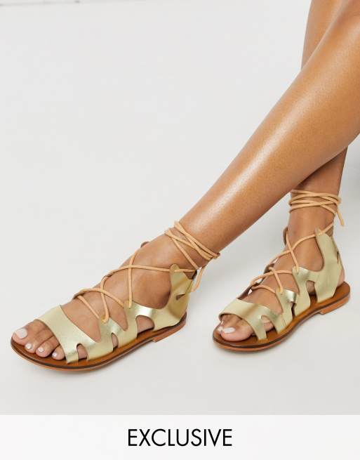 Gold leather hot sale gladiator sandals