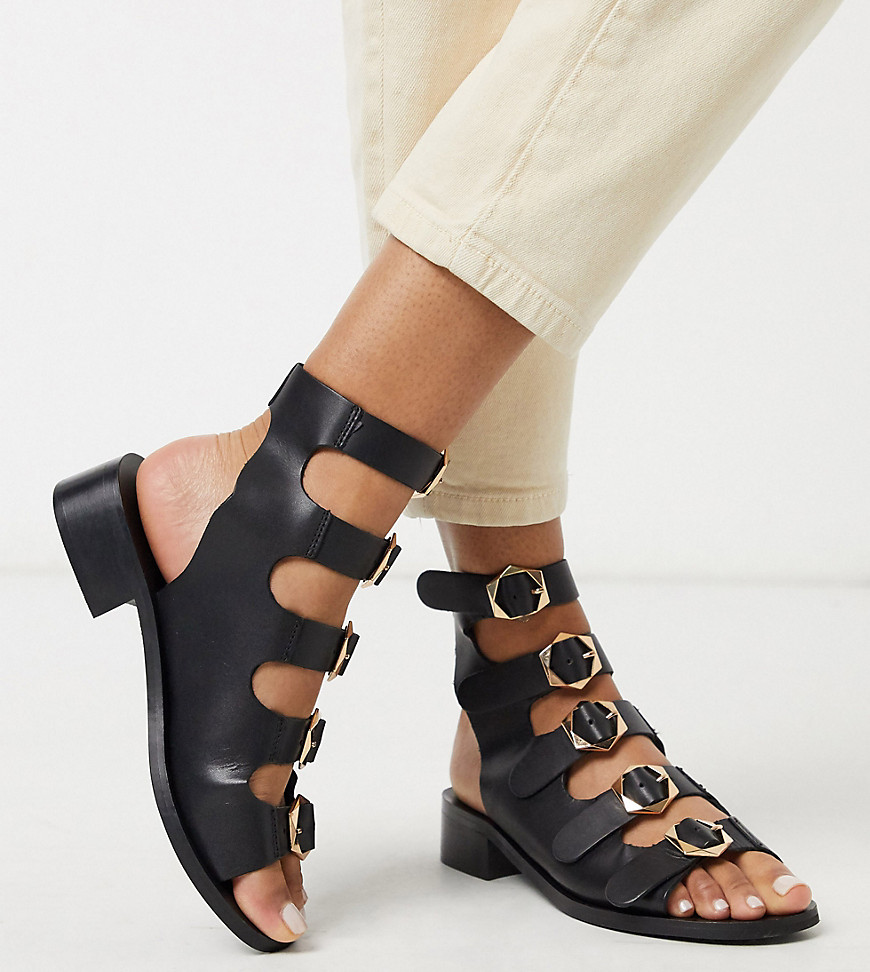ASRA – Exclusive – Starlet – Svarta gladiator-sandaler i läder med spänne