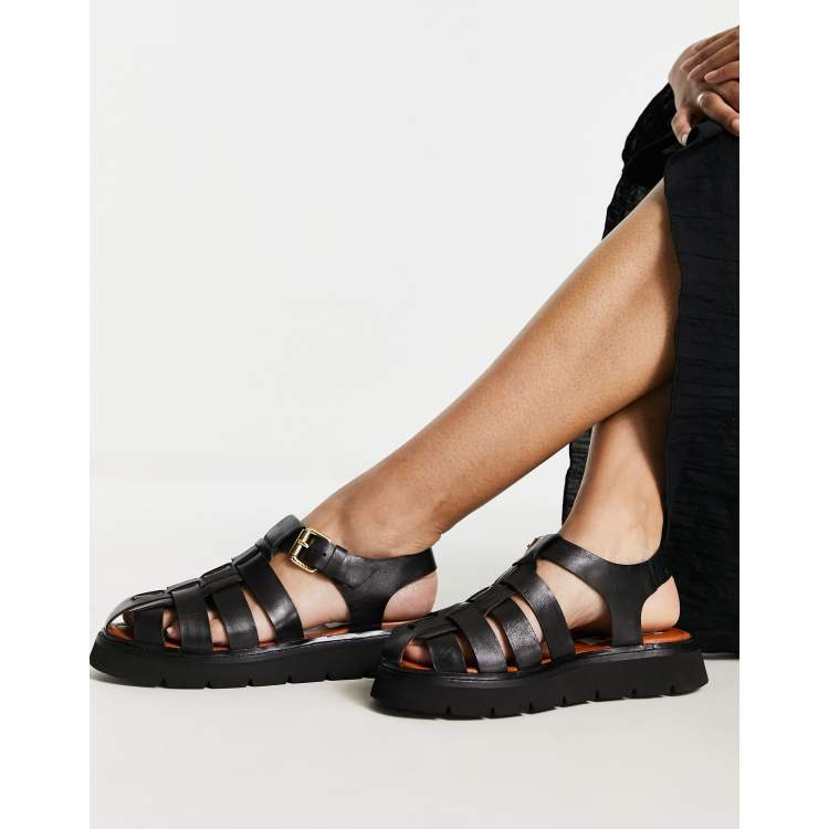 Black best sale fisherman sandals