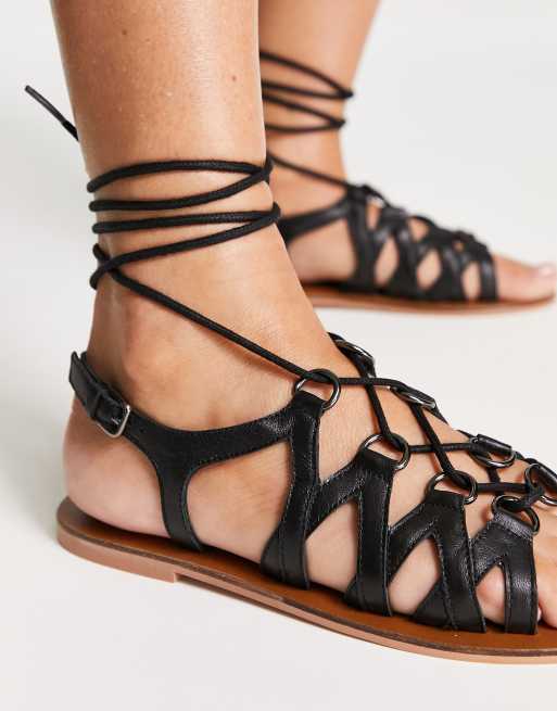 Black flat sale gladiator sandals