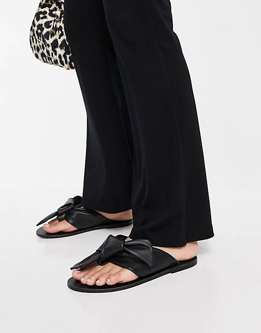ASRA Susanna flat sandals in with knot detail in black