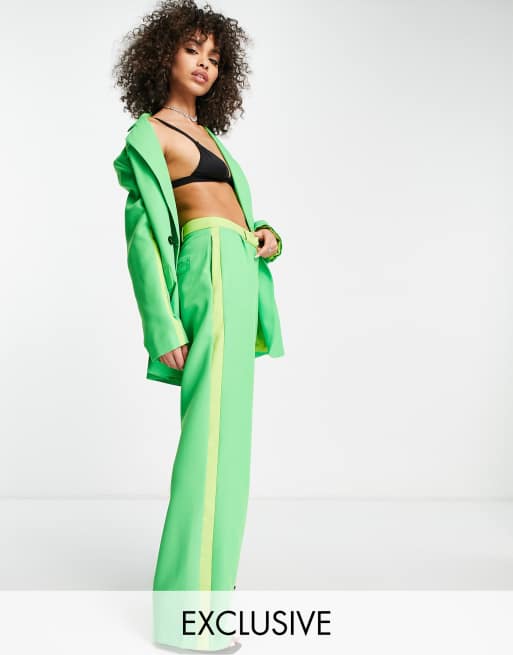 ASYOU - Broek met wijde pijpen en figuurnaden in groen