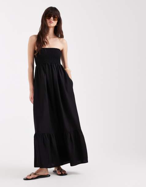 AWARE – Czarna sukienka maxi z dekoltem bandeau - view 1