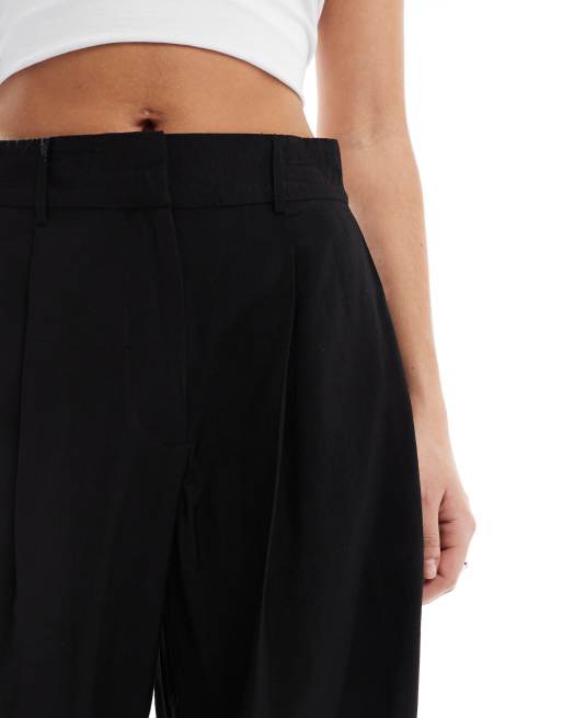 AWARE – Czarne eleganckie spodnie o fasonie dad z drapowaniem, 5 z 5