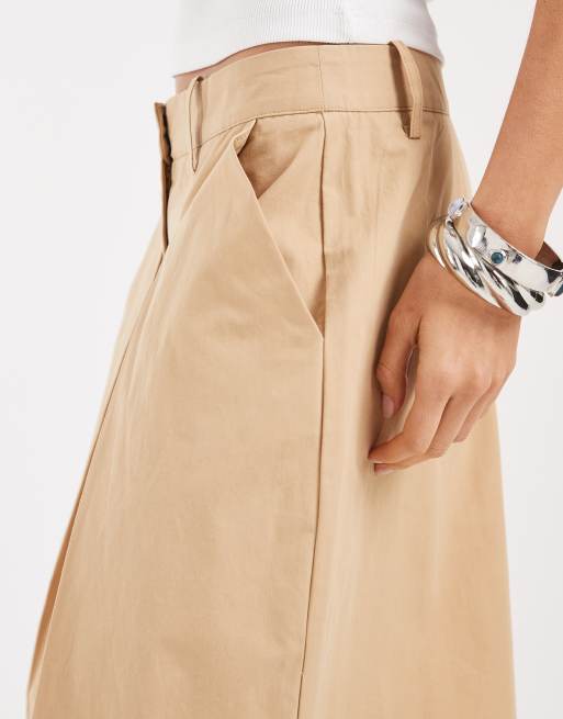 AWARE deep pleated front longline shorts in beige, 5 of 5