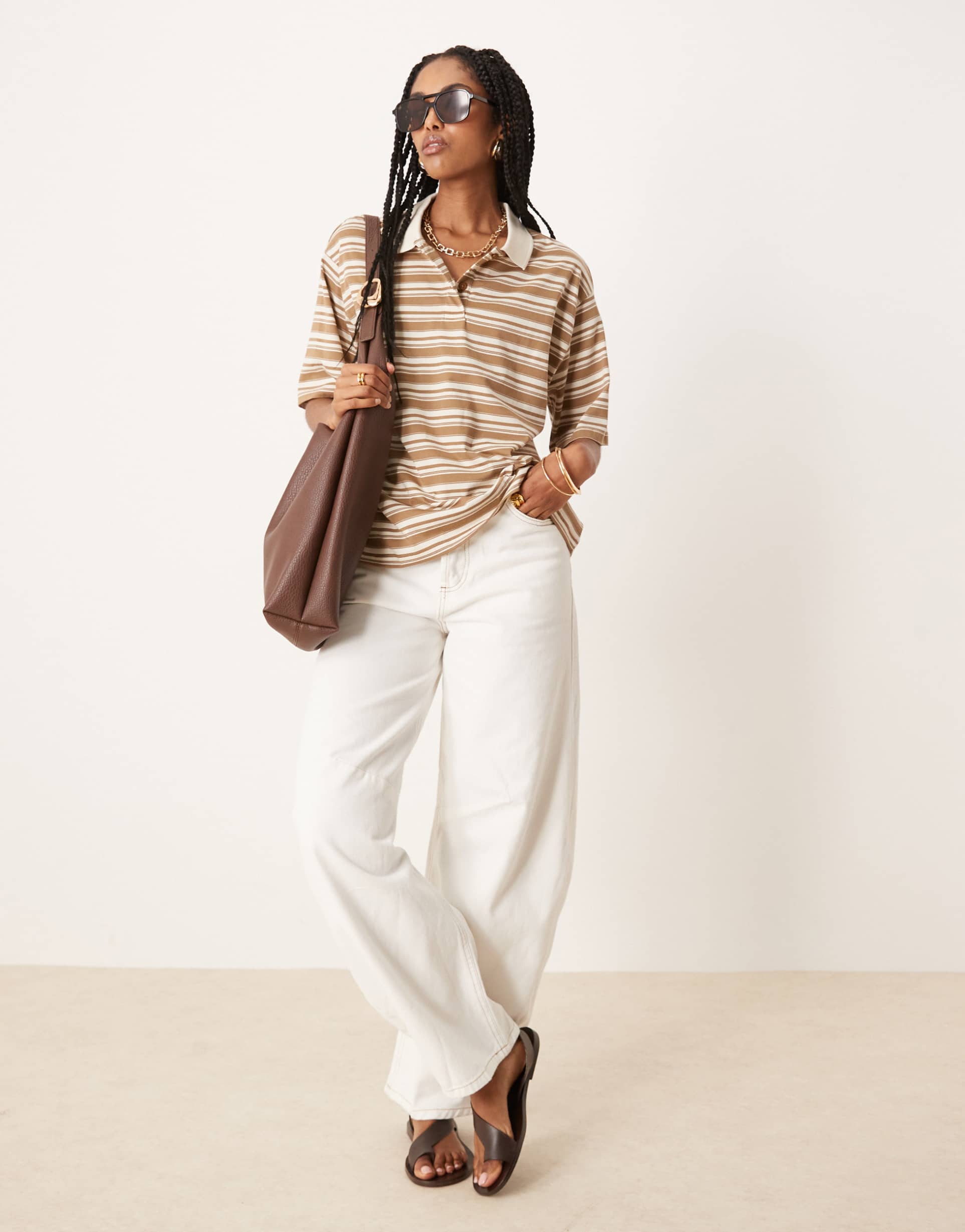 aware half sleeves polo top in neutral stripes