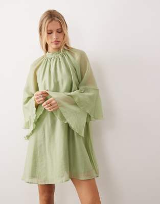 AWARE - Hochgeschlossenes Minikleid in Kräutergrün mit ausgestellten Ärmeln