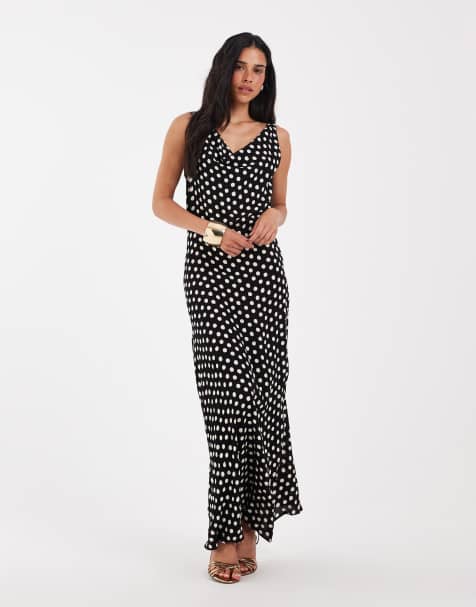AWARE mouwloze maxi-jurk met gedrapeerde halslijn in zwart met stippenprint - view 1