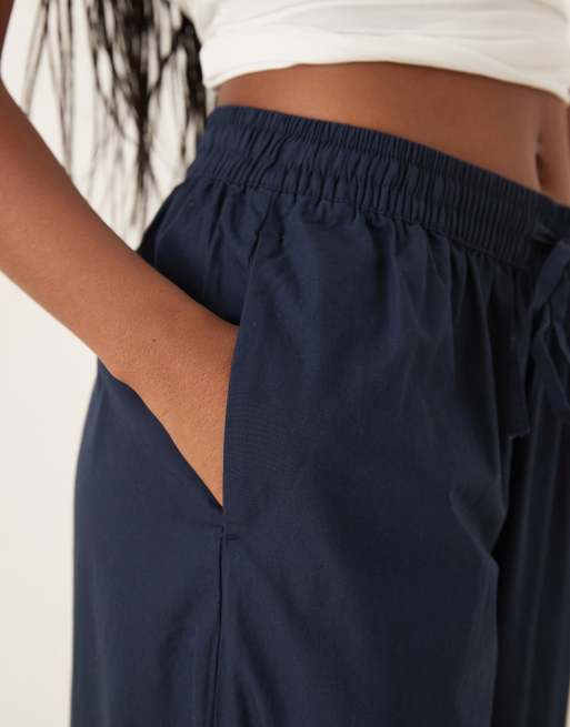 AWARE - Pantaloni a fondo super ampio allacciati in vita color blu navy, 4 di 5