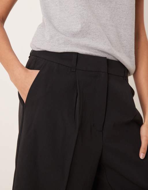 AWARE pleat front tailored shorts in black, 2 of 5
