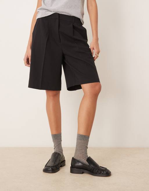 AWARE pleat front tailored shorts in black, 5 of 5