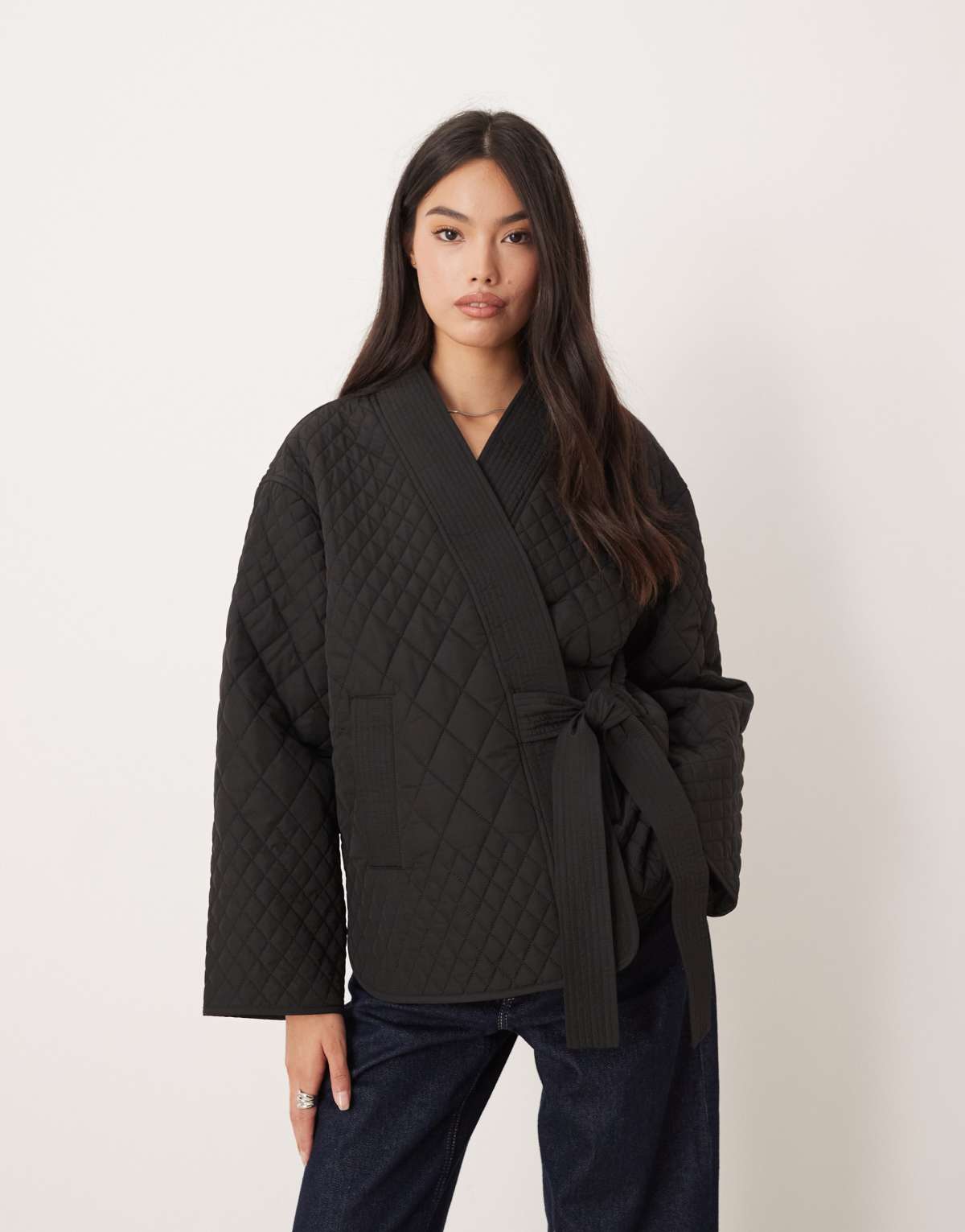 AWARE quilted clean wrap tie side jacket in black