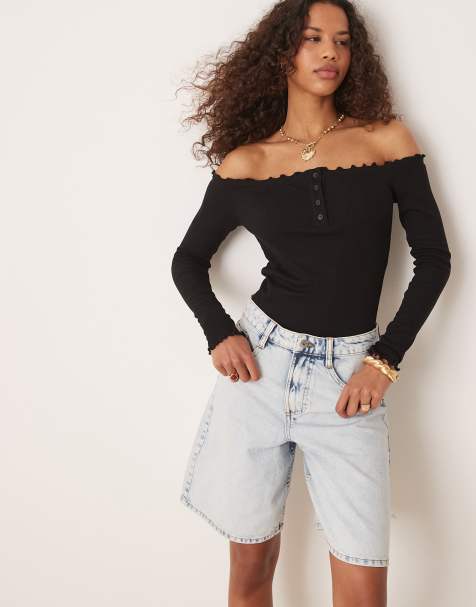 AWARE ribbed lettuce edge bodysuit in black - view 1