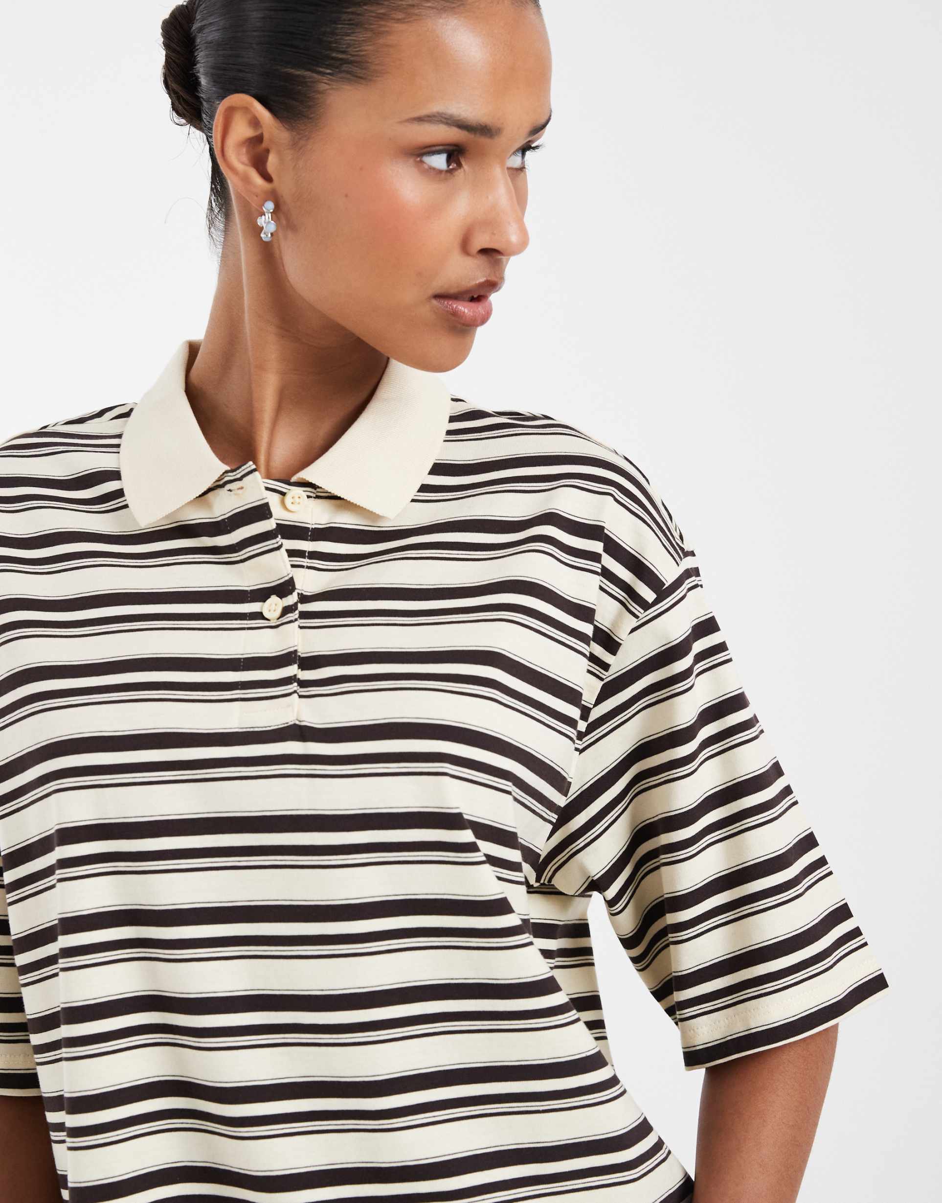 aware short sleeve polo top in yellow and brown stripes