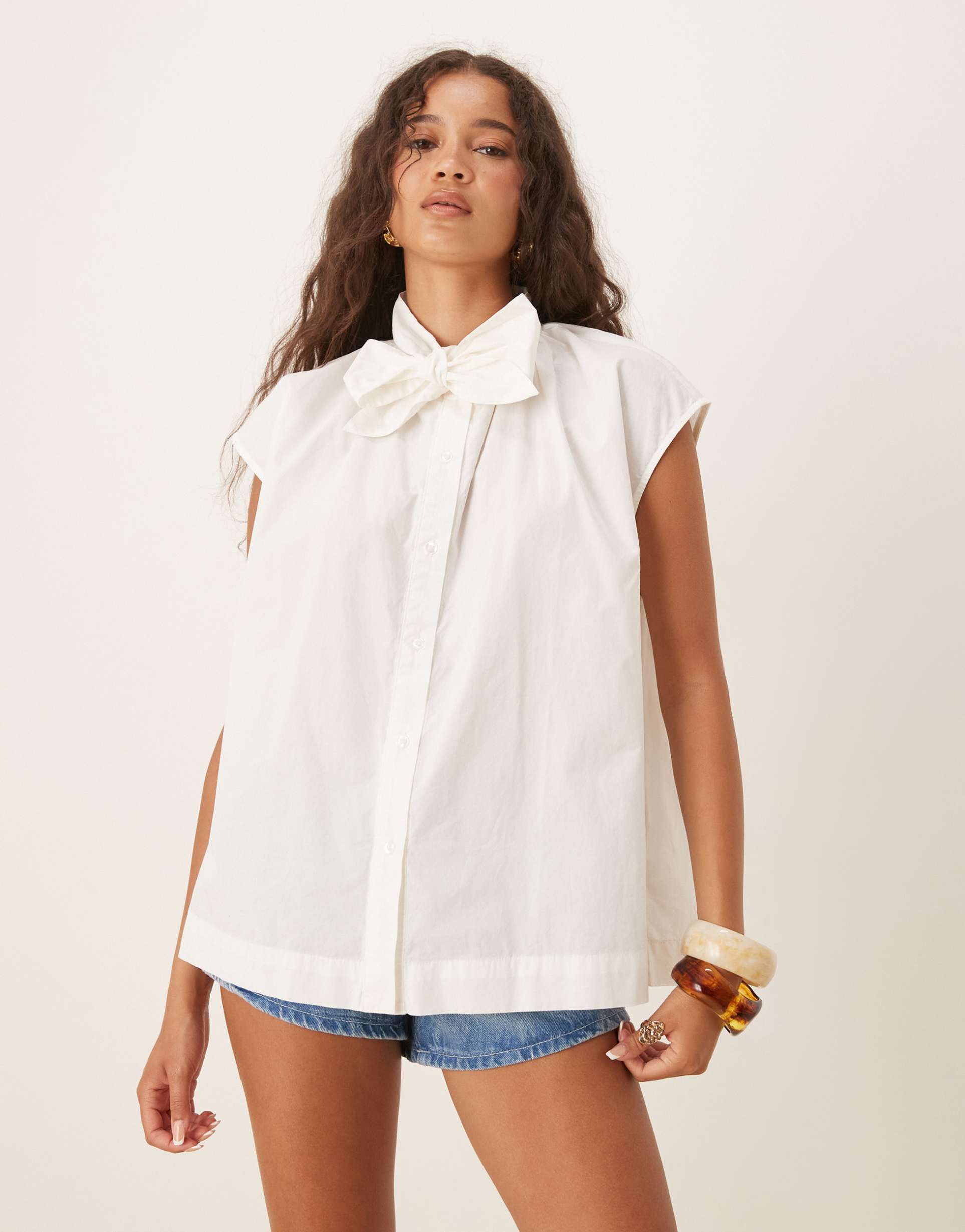 aware sleeveless boxy pussybow detail shirt in white