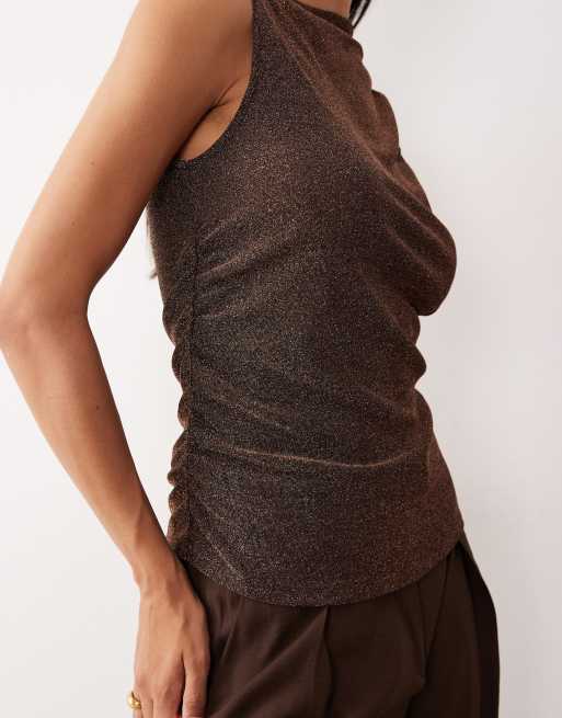 AWARE - Sort top med asymmetrisk bindeskulder og kobberfarvet glimmer, 4 af 4
