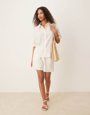 textured relaxed shorts in white - part of a set