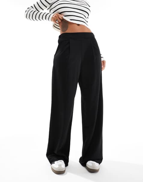AWARE – Weit geschnittene Hose mit Bundfalten vorn, in Schwarz - view 1