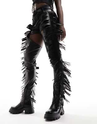 Gecky fringed belted over the knee festival boots in black