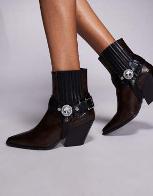 Lenkov heeled western ankle boots with harness detailing in brown