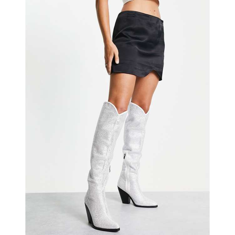 White cowboy shop boots with rhinestones