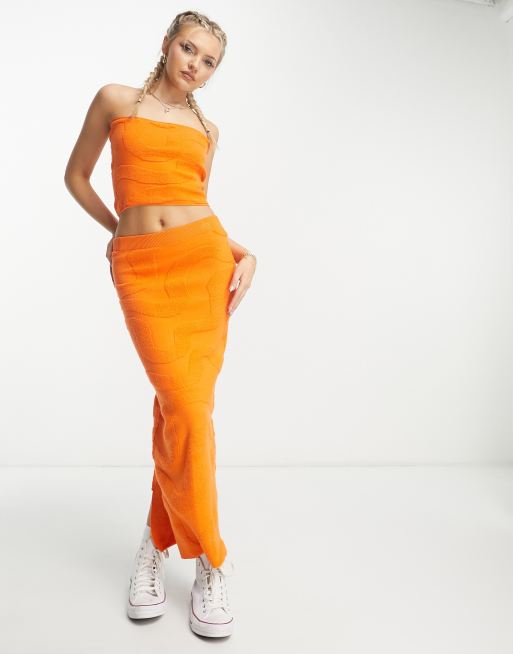 Bailey Rose maxi bodycon skirt in orange wavy knit part of a set