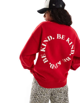 relaxed sweatshirt in red with Be Kind graphic