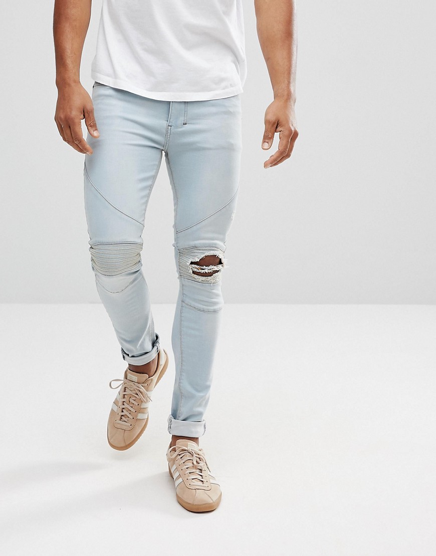 фото Байкерские джинсы скинни с рваными коленями religion-синий