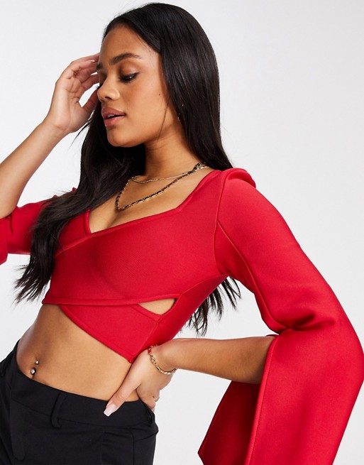 Band Of Stars bandage wrap over crop top with split flare sleeve in raspberry