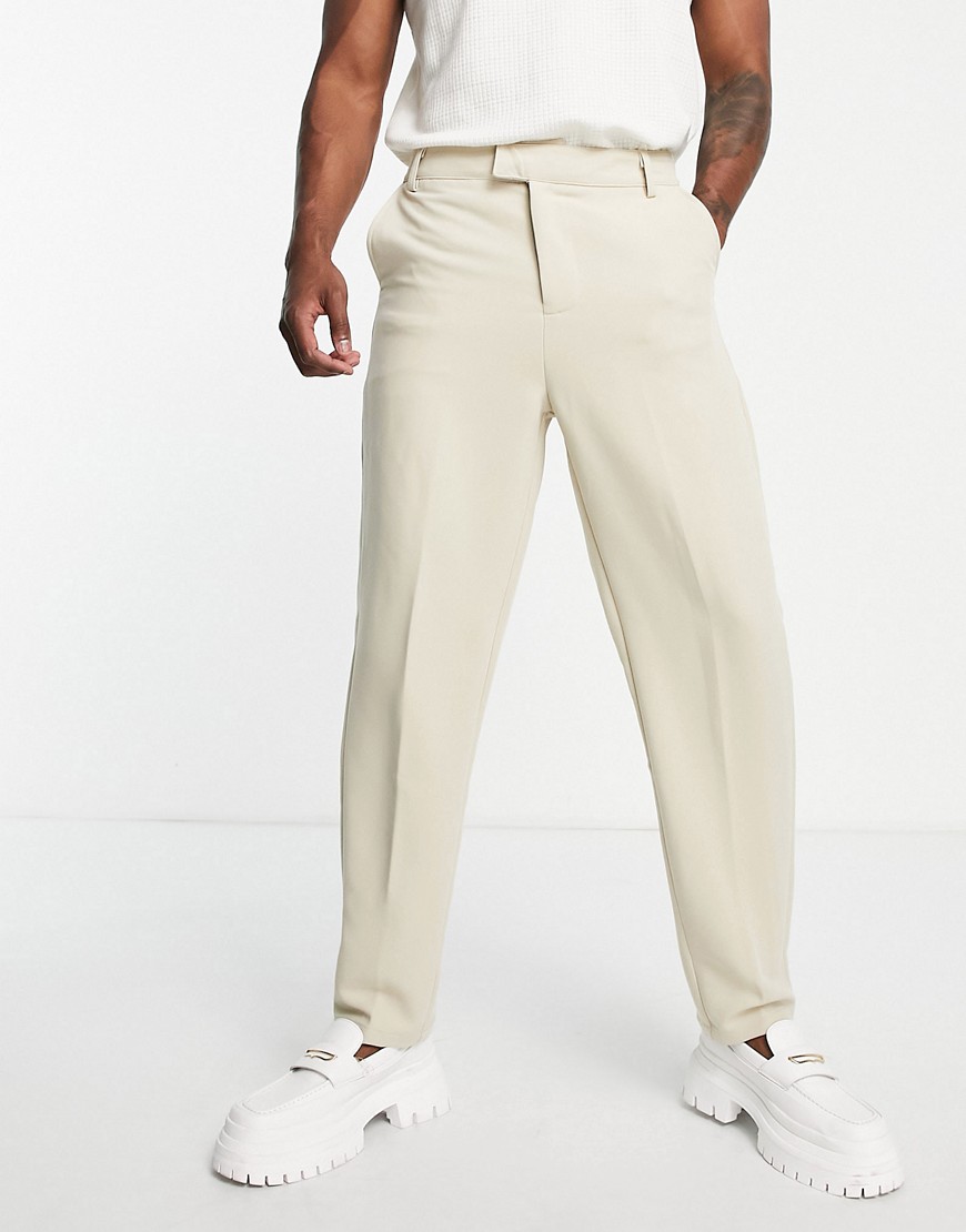 BANDO CARROT FIT TAPERED JERSEY SUIT PANTS IN STONE-NEUTRAL
