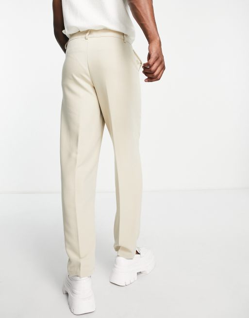 Bando – Ljusbeige avsmalnande kostymbyxor i jersey med morotspassform, 3 av 4