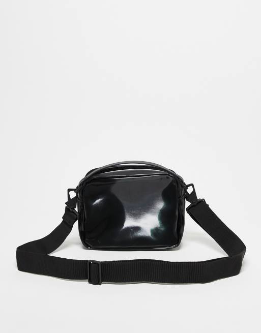 Bandolera negra cuadrada impermeable 14100 de Rains, 3 de 3