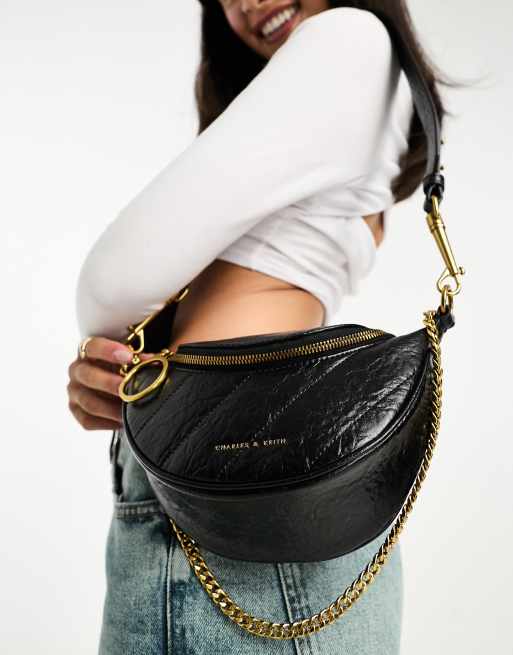Bandolera negra guateada con diseño multiposición estilo riñonera de Charles & Keith , 4 de 4