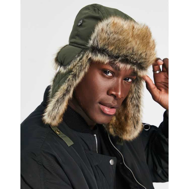 ASOS DESIGN trapper hat with badge in brown faux fur