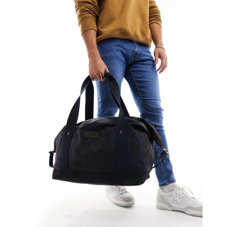 Barbour Essential wax holdall in navy | ASOS