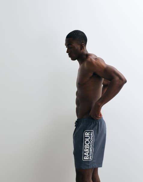 Barbour International large logo swim shorts in blue - view 1