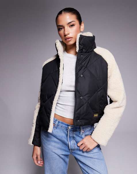 Barbour International  oversized quilted jacket with fleece sleeves in black & beige 
