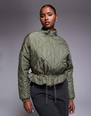 Barbour International - Pagan - Steppjacke in Khaki mit Raffung in der Taille-Grün