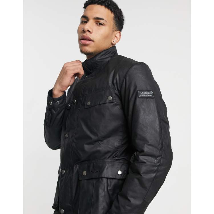 Barbour international slim wax jacket with pocket store detail in black