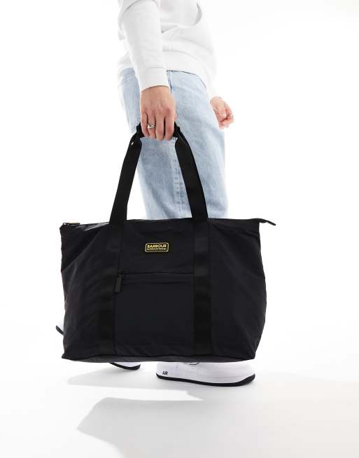 Barbour International Unisex weekend holdall in black | ASOS