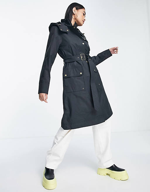 Barbour International waterproof trench coat with buckle detail in black |  ASOS
