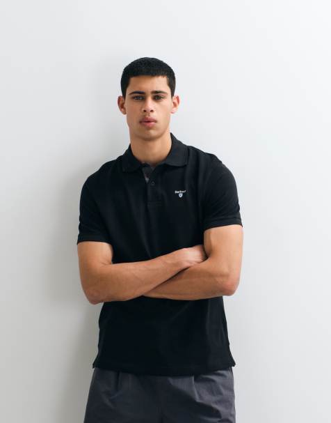 Barbour short sleeve pique tailored logo polo shirt in black - view 1