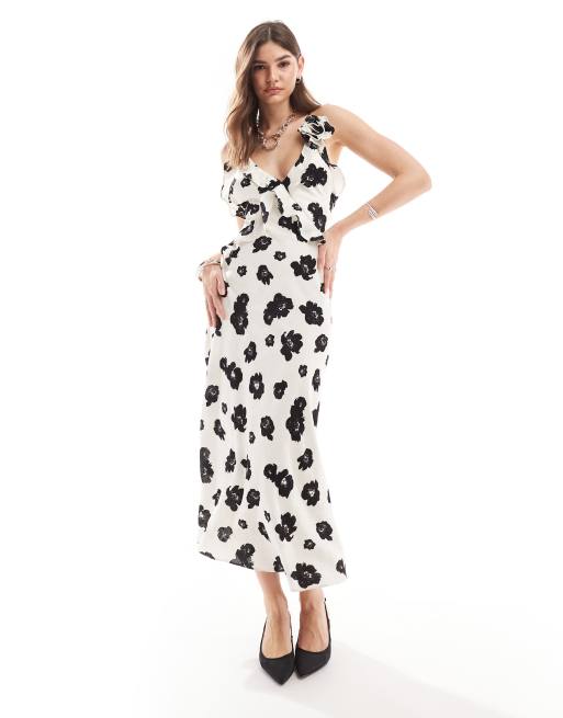 Bardot - Satijnen maxi jurk met open achterkant in zwart-witte bloemenprint