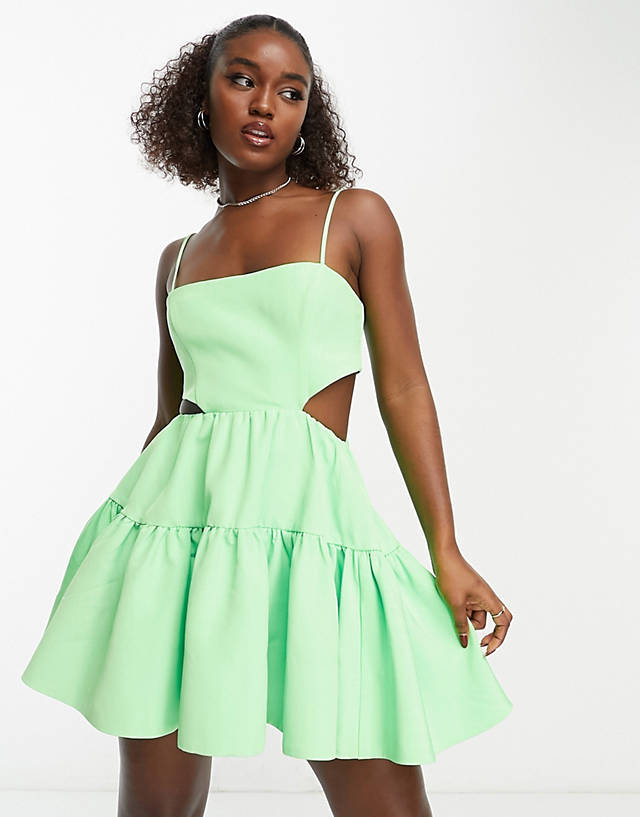 Bardot - structured cut-out mini dress with pockets in vibrant green