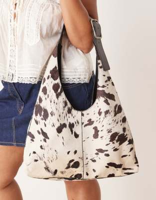 Barneys Originals Real leather cow print shoulder bag in black / white