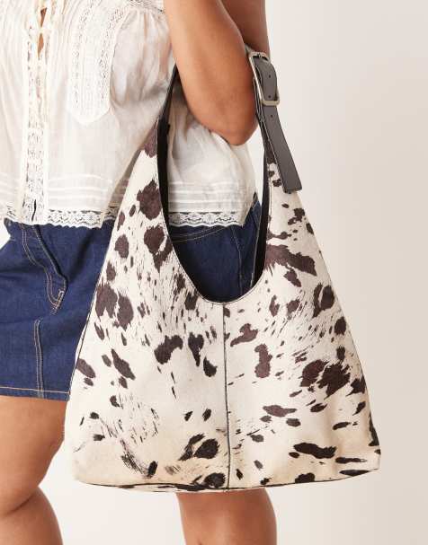 Barneys Originals Real leather cow print shoulder bag in black / white - view 1