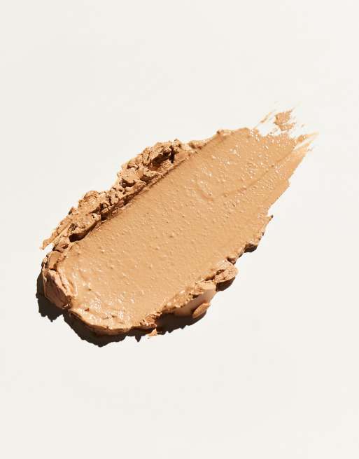 Base de maquillaje en barra de cobertura semitransparente Skin Silk Glow Tint de Revolution , 2 de 4