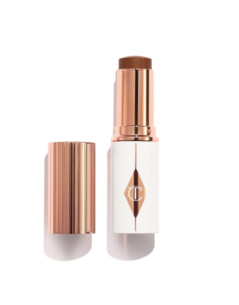 Base de maquillaje iluminadora traslúcida Unreal Skin de Charlotte Tilbury - view 1