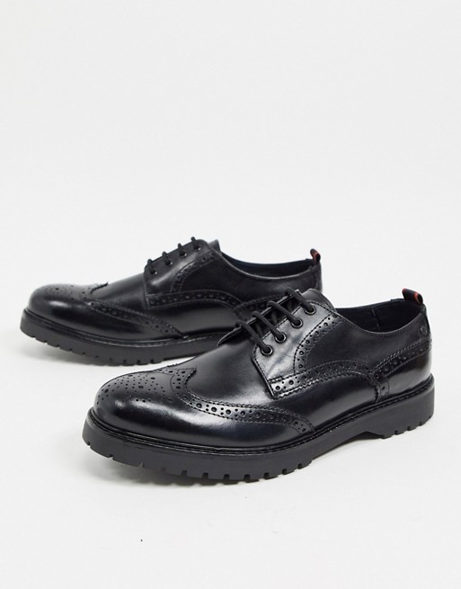 Base London riddle brogues in black leather