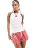 Monki heavy jersey shorts with curved hem in orange